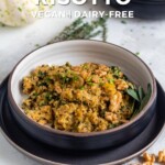 Pin for pinterest graphic with bowl of quinoa risotto and text on top.