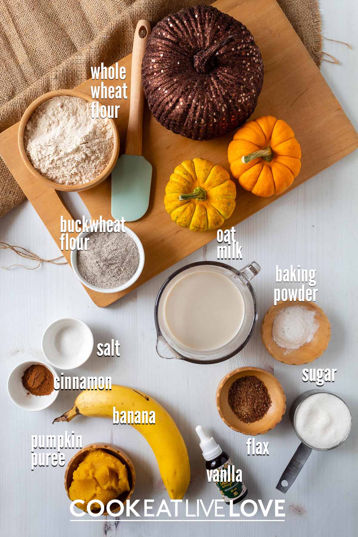 Ingredients to make healthy pumpkin banana muffins on the table.