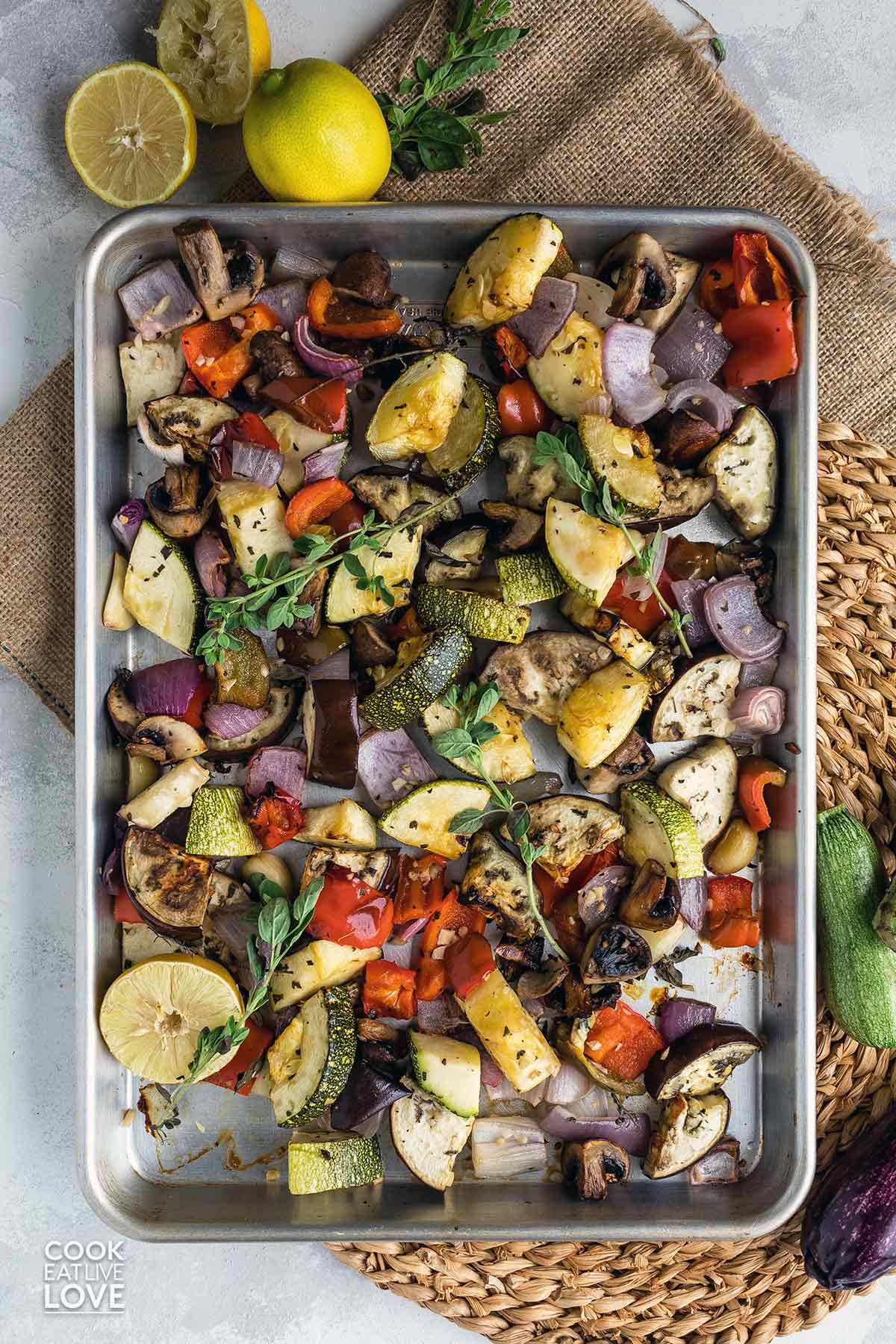 Mediterranean roasted vegetables on baking sheet fresh from the oven.