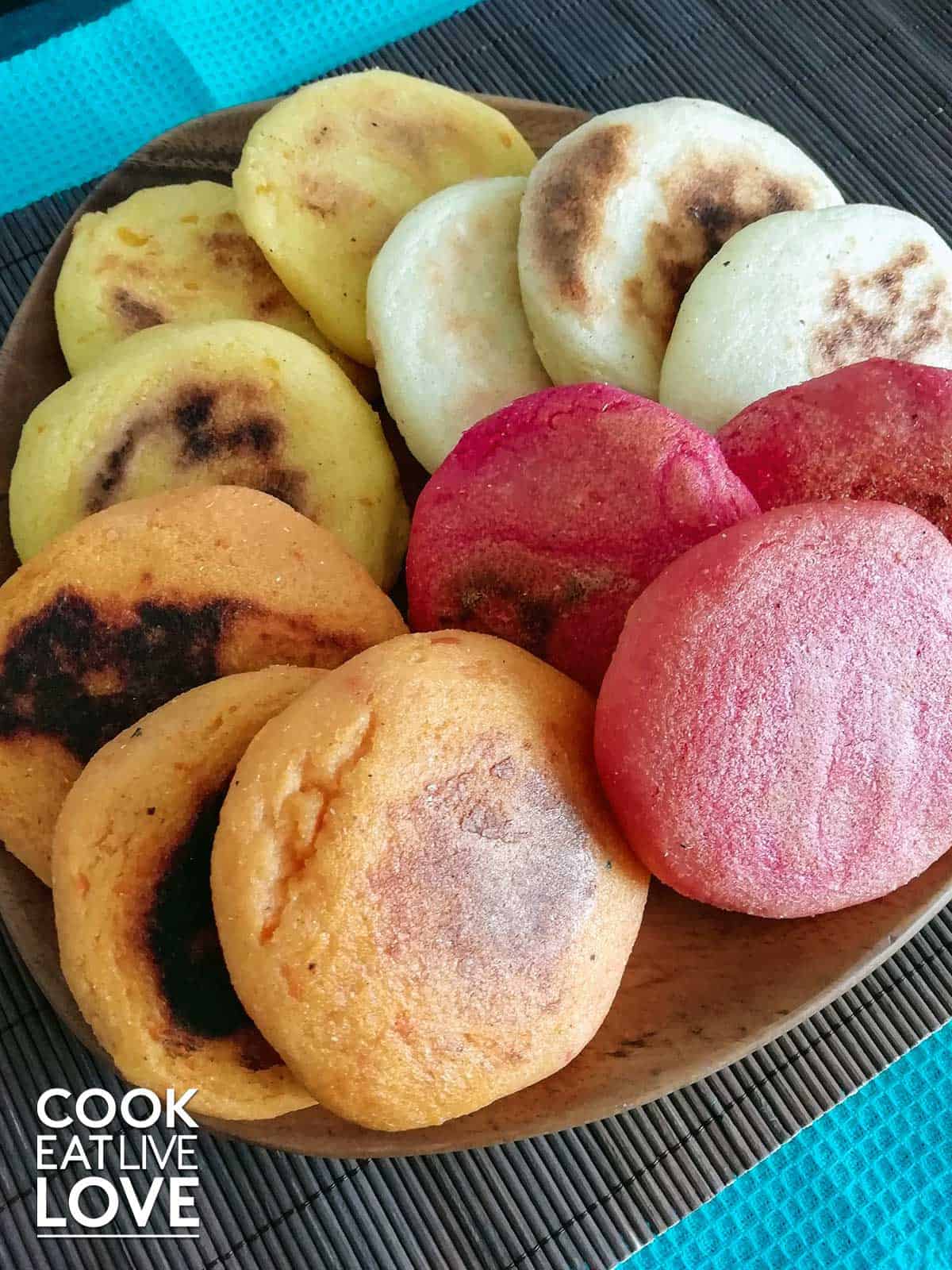 Colored Venezuelan arepas on a plate ready to eat