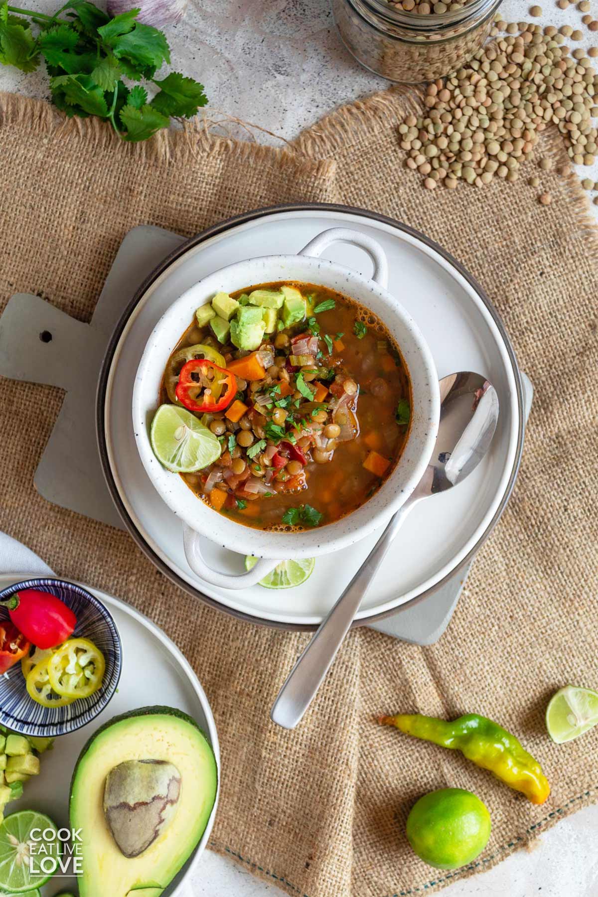Bowl of vegan lentil soup on a plate.