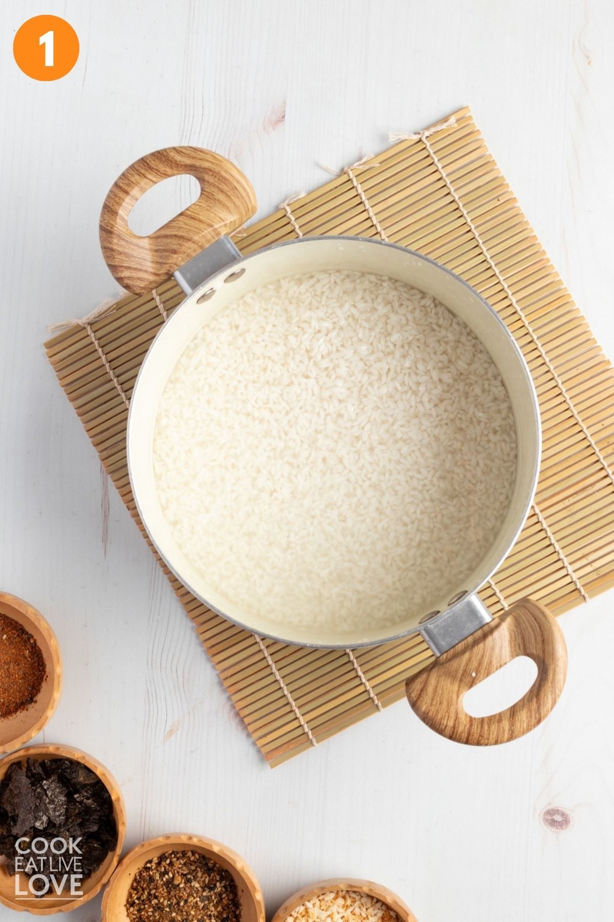 Rice and water in a pot. 