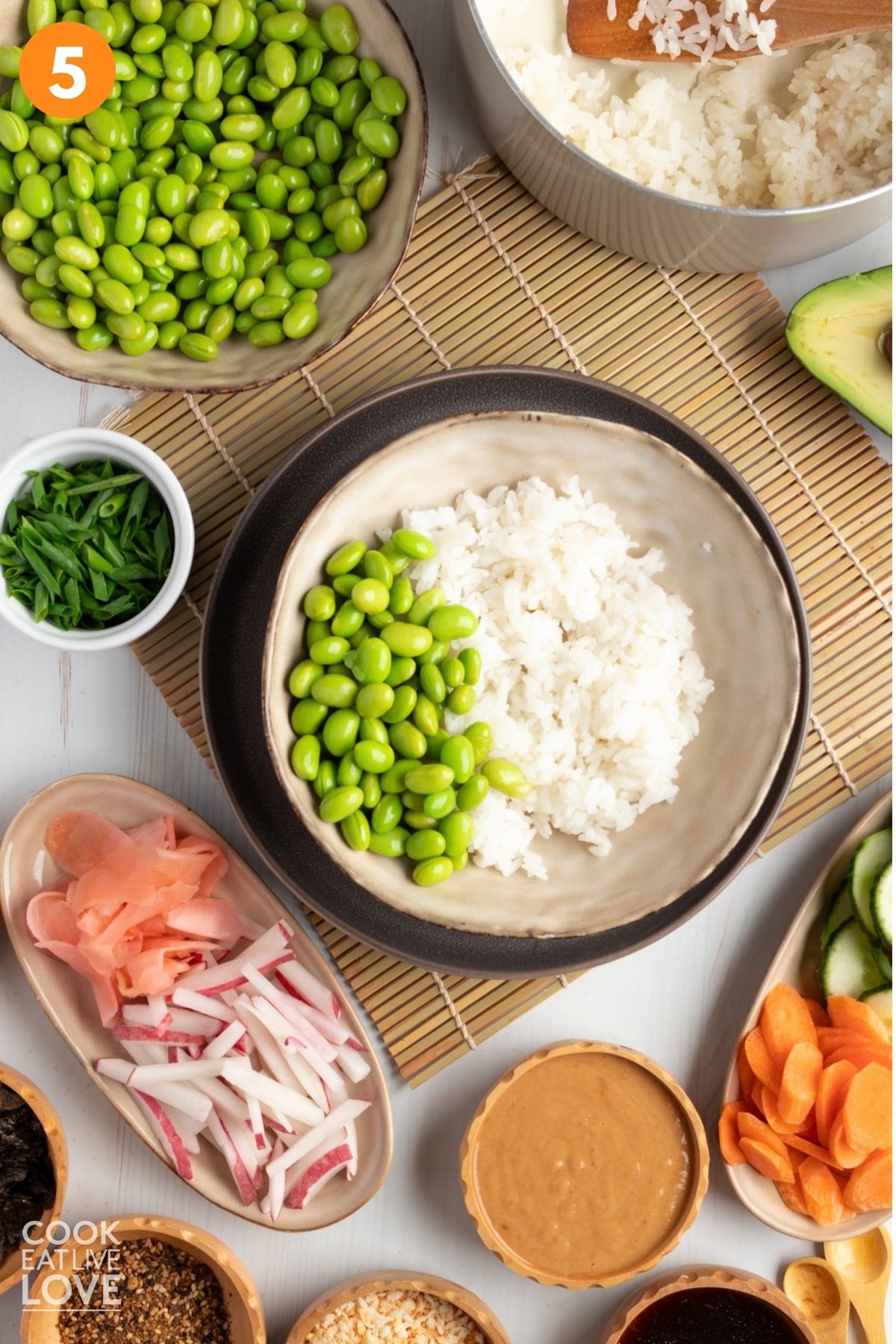 Rice and edamame in a bowl.