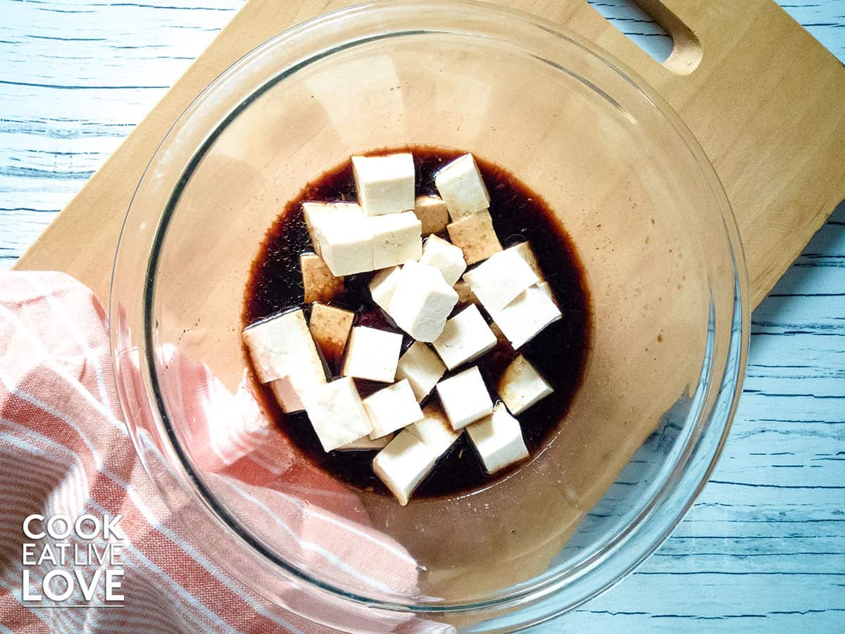 Tofu is placed into marinade to absorb all the flavor.