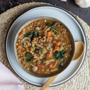 Bowl of vegan lentil stew instant pot on the table.