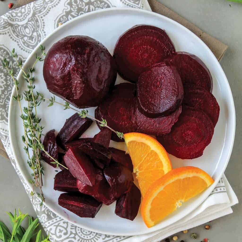 Beets with stems on a table