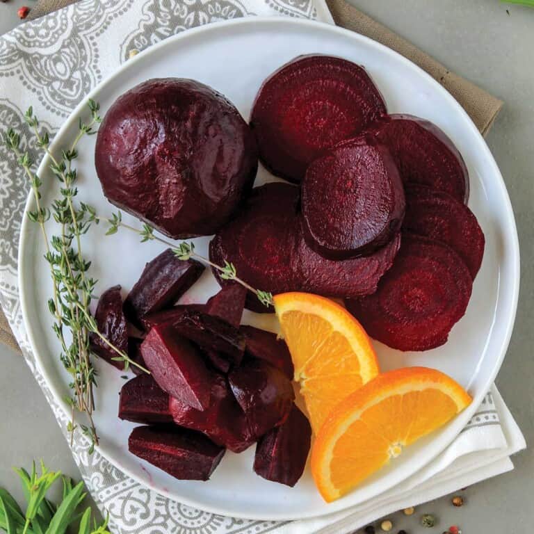 Beets with stems on a table