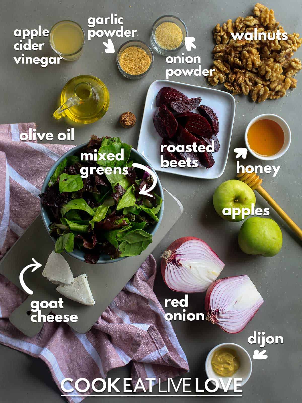 Ingredients to make roasted beetroot salad on the table with text labels