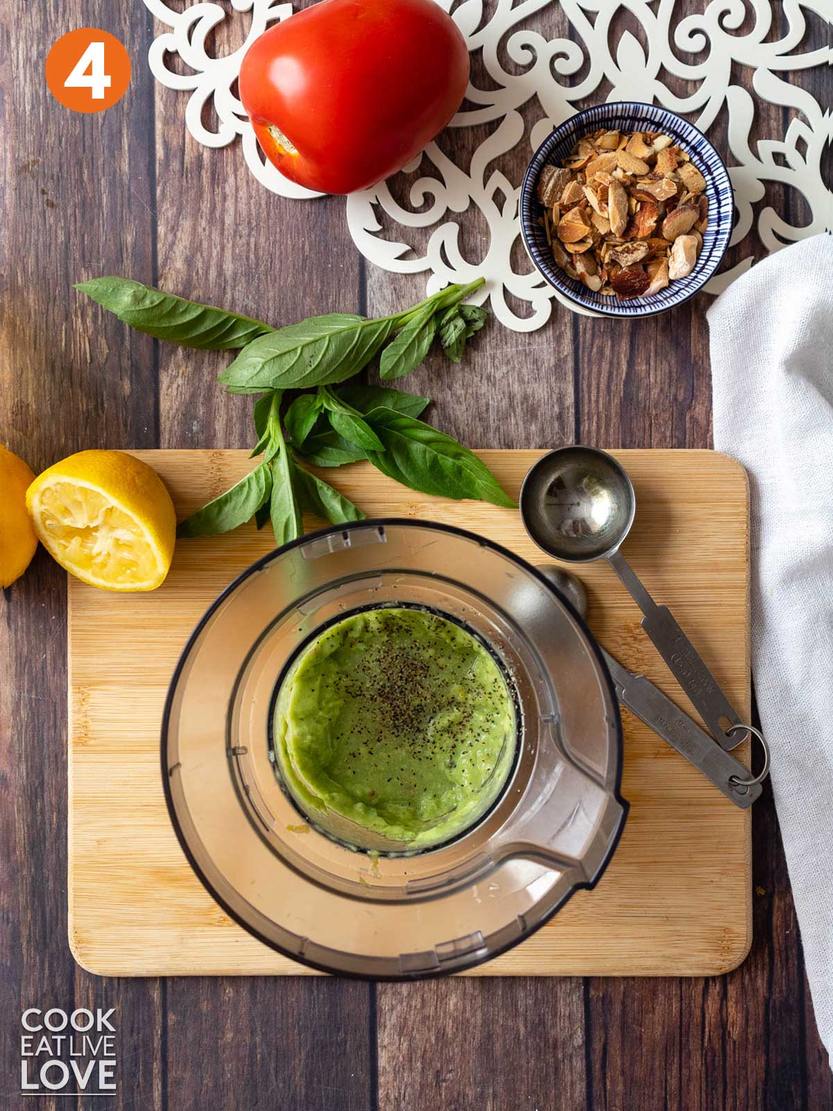 Lemon basil dressing is blended and ready to serve.