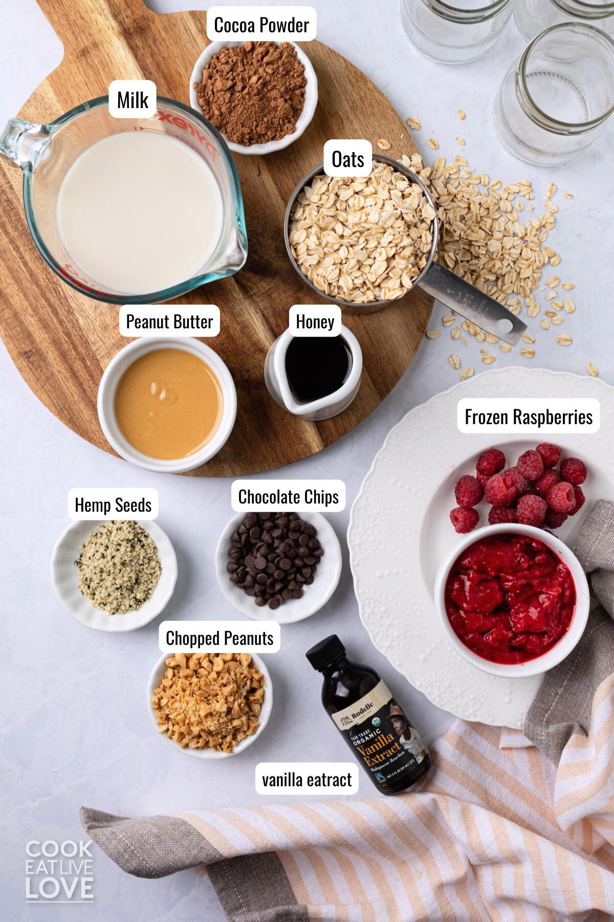 Ingredients to make pbj overnight oats on the table.