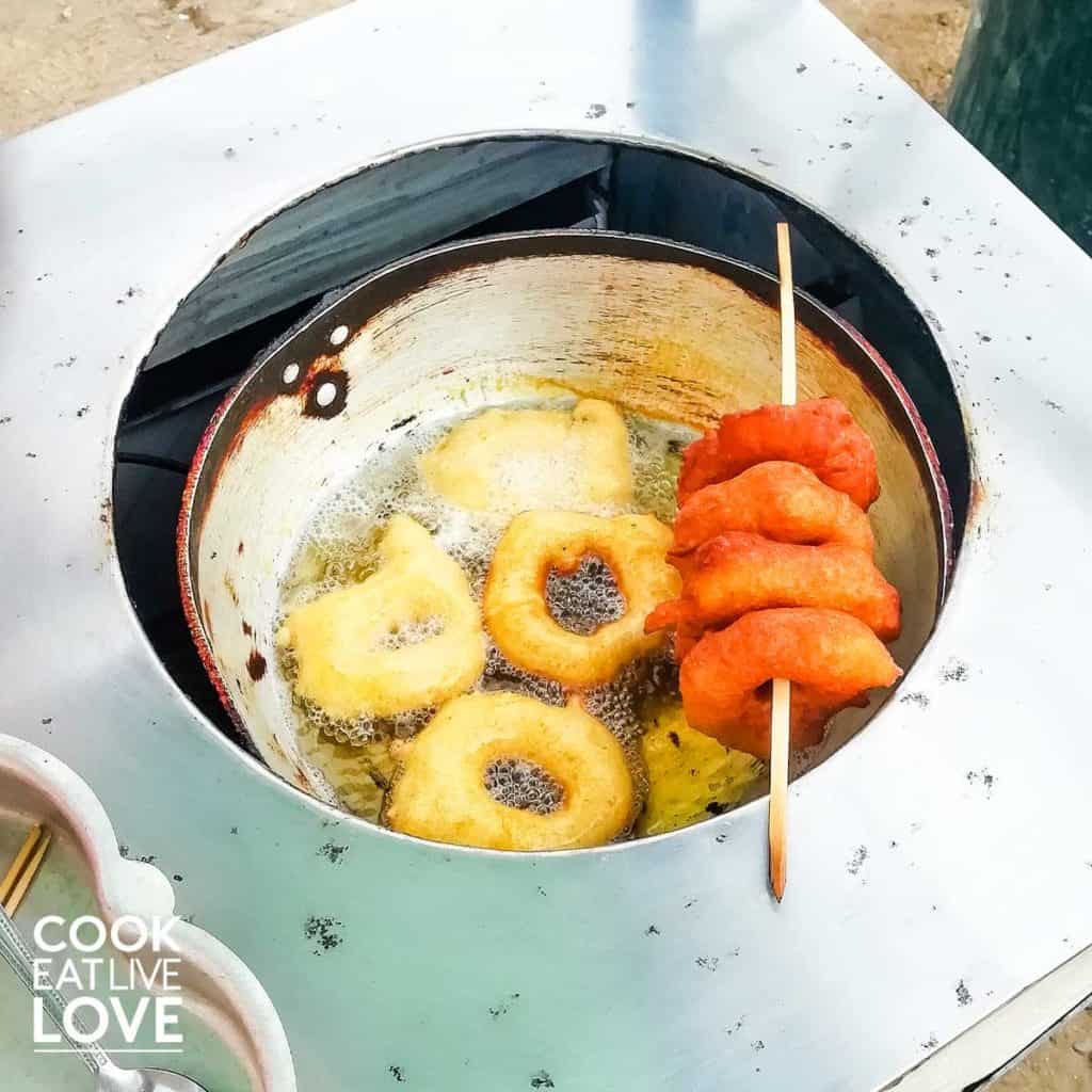 Food in lima Peru inlcudes picarones cooking in oil
