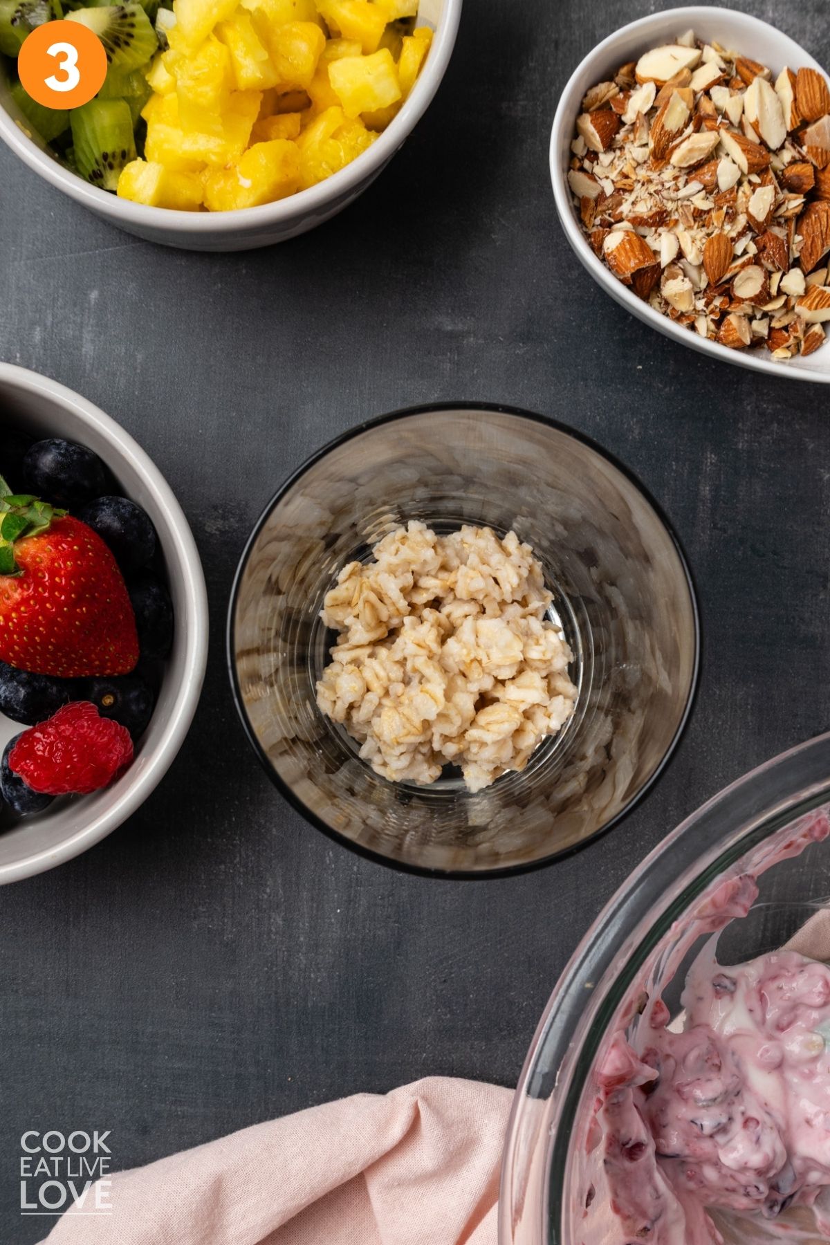 Oatmeal added to a glass.