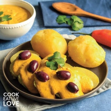 Potatoes topped with huancaina sauce.