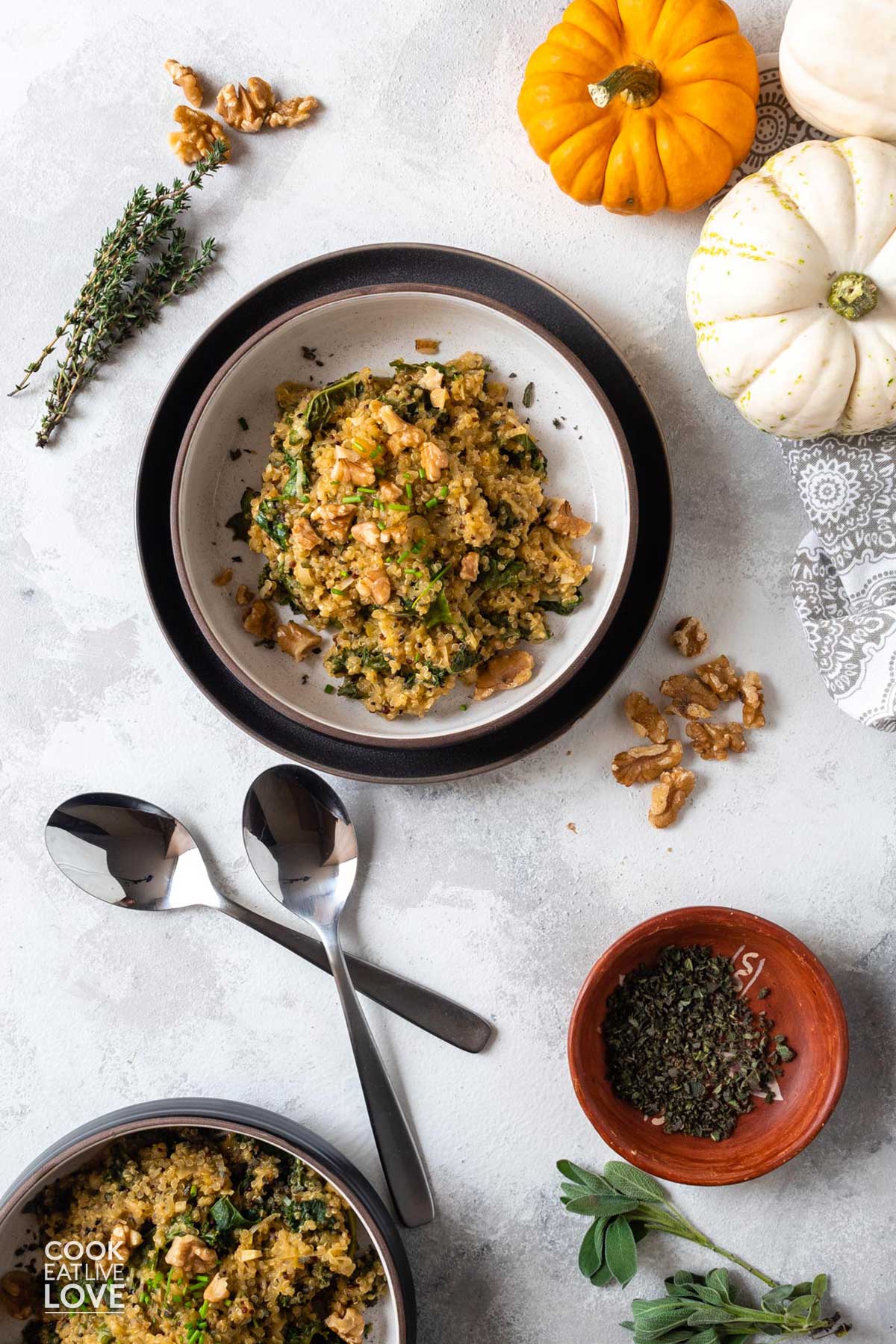 Quinoa risotto with kale and winter squash in bowls.