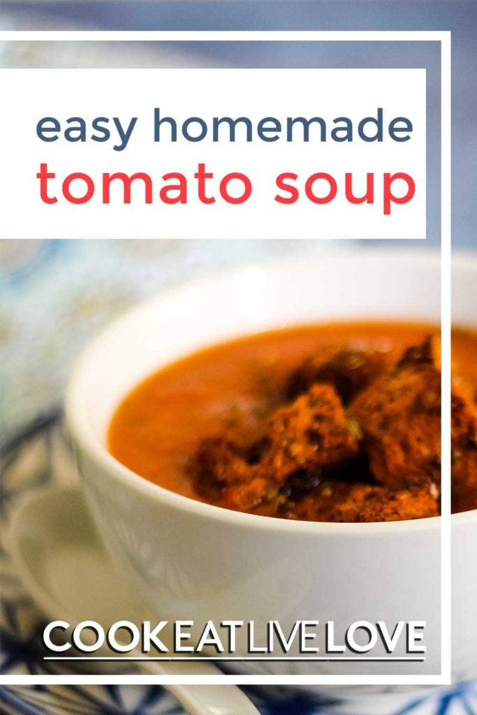 Pin for pinterest of close up of homemade tomato soup with text on top.