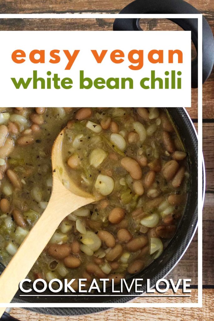 Pin for pinterest of pot of white bean chili with wooden spoon stirring it.