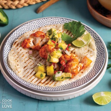 Tortilla with cauliflower and avocado on a plate