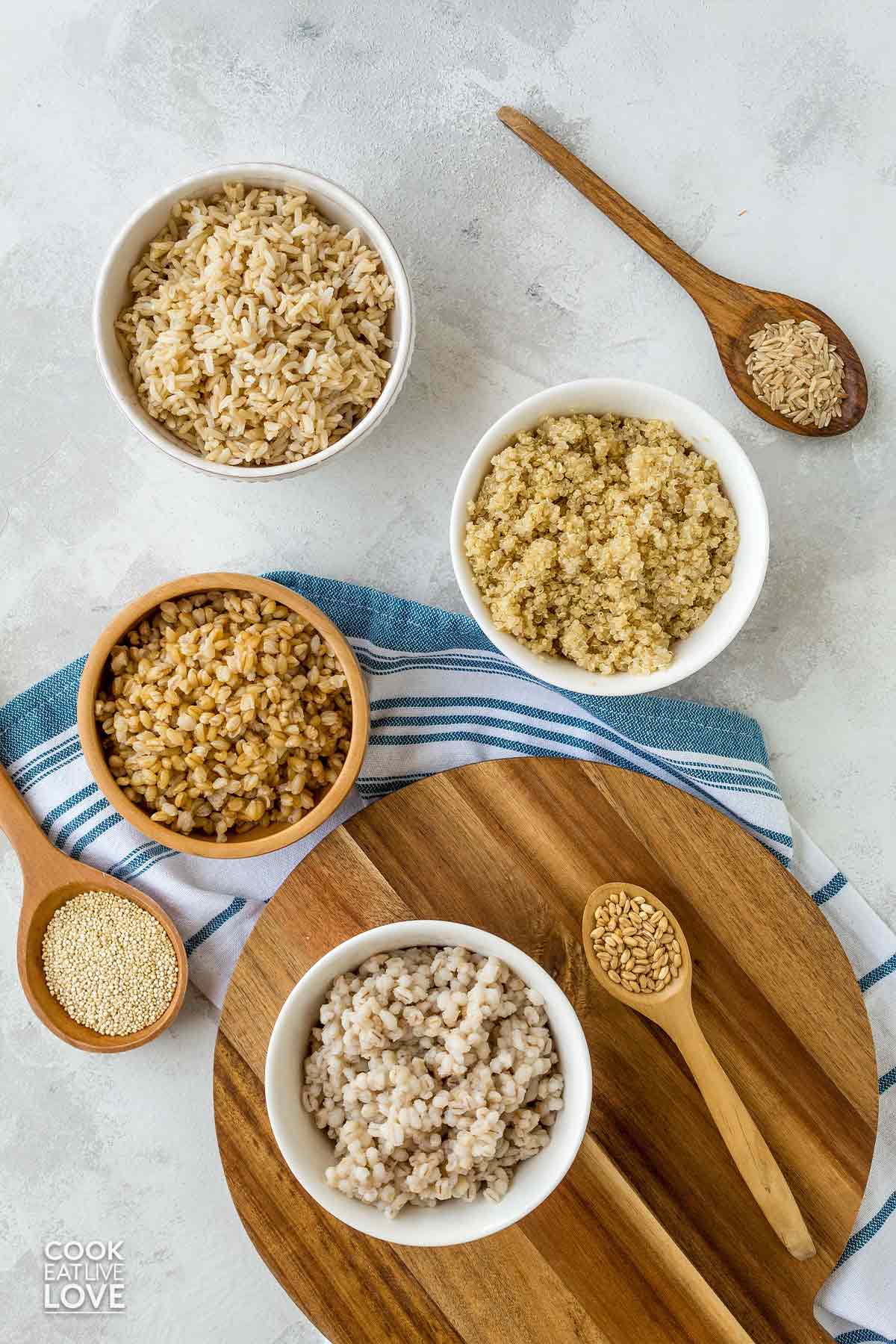 Bowls of cooked grains on the table.