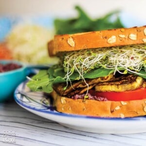 A roasted veggie sandwich on the table.