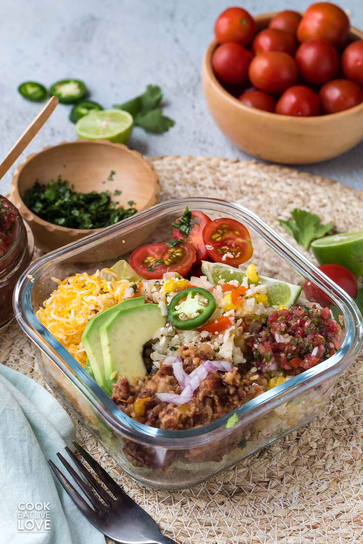 Burrito bowl meal prep in glass container to carry on the go.