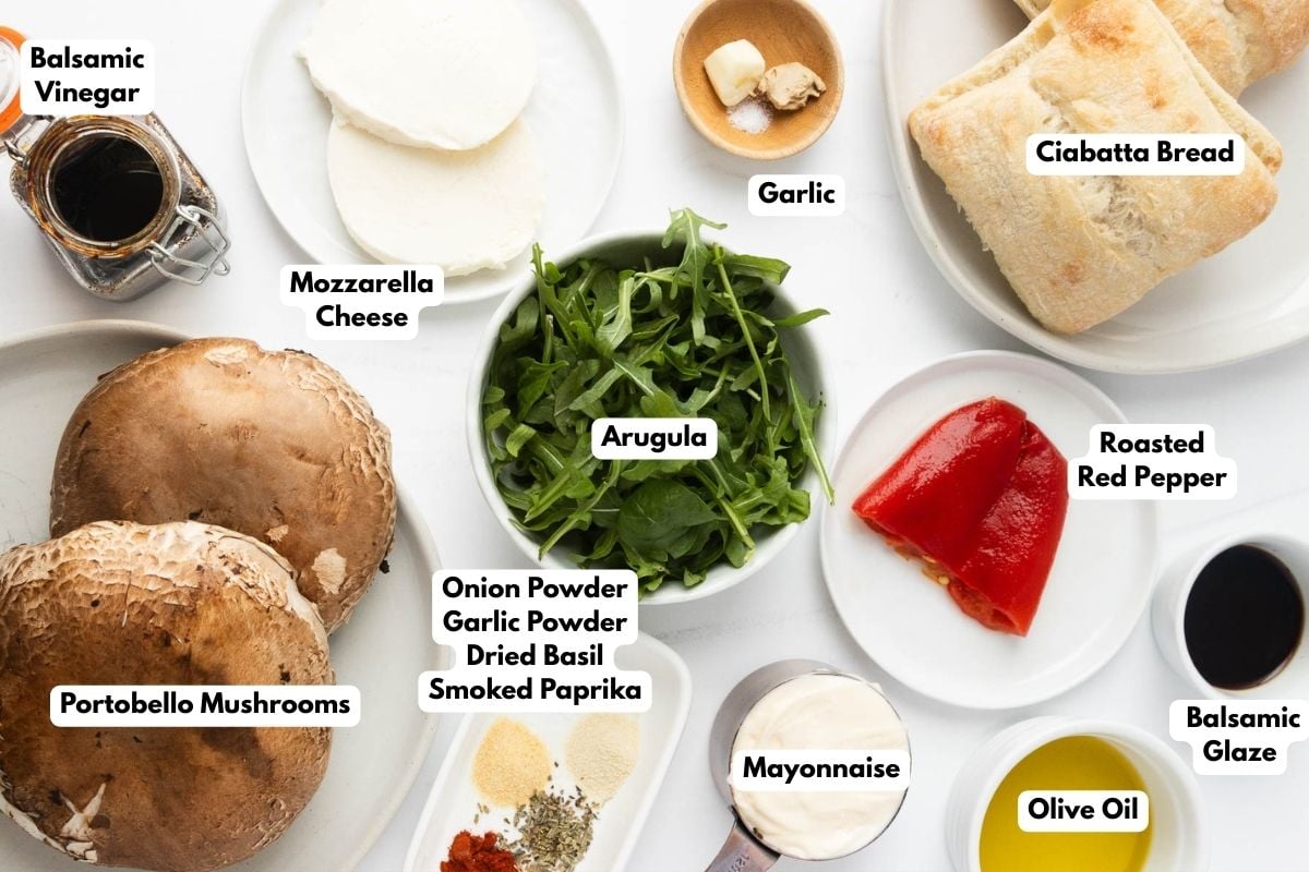 Ingredients to make a portobello sandwich on a table in bowls. 