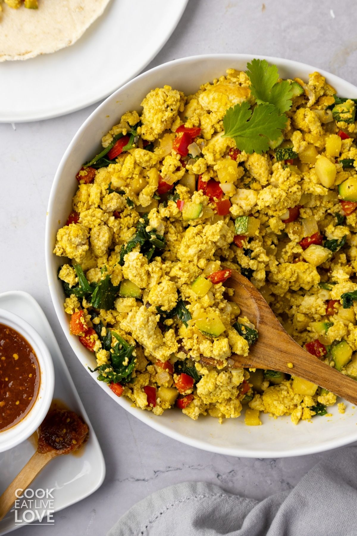 Tofu scramble with veggies in a bowl. 