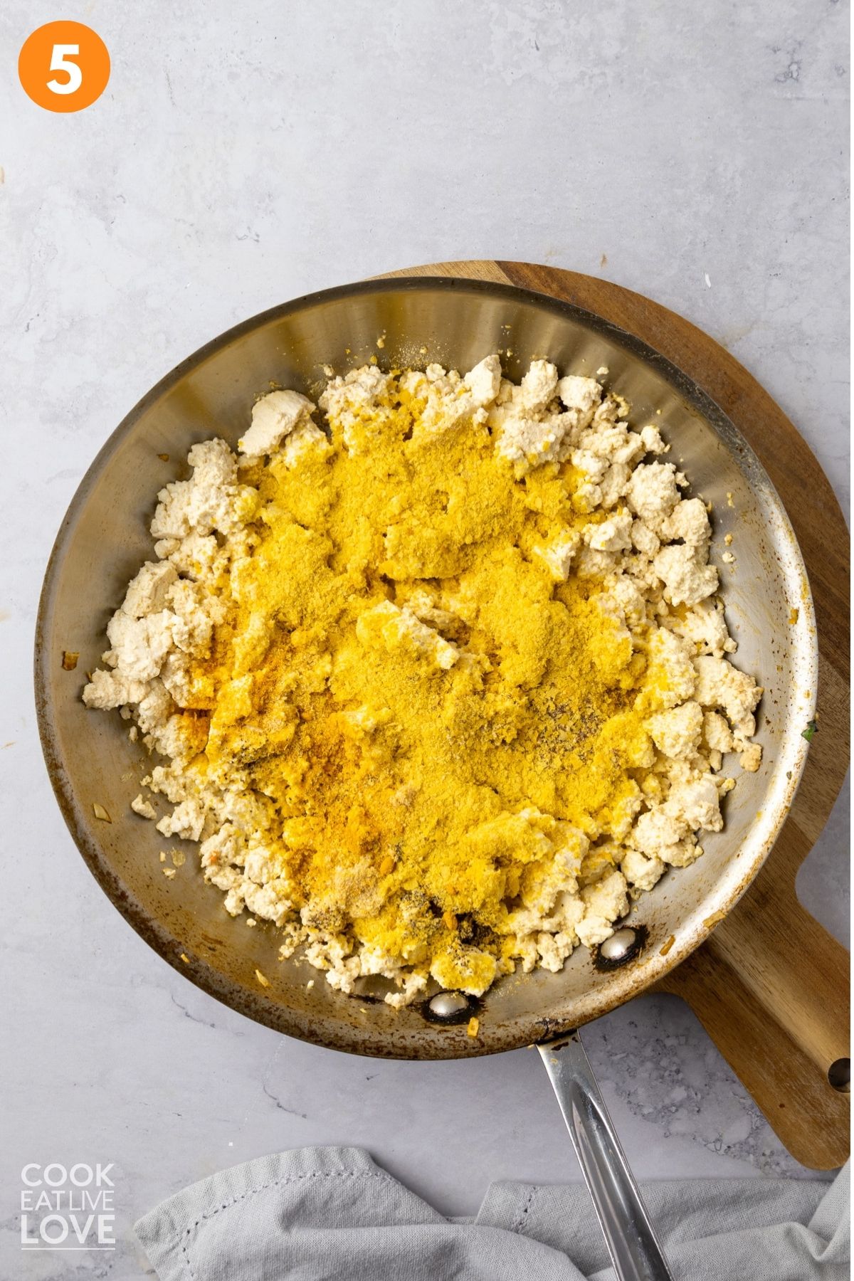 Seasonings added to the skillet. 
