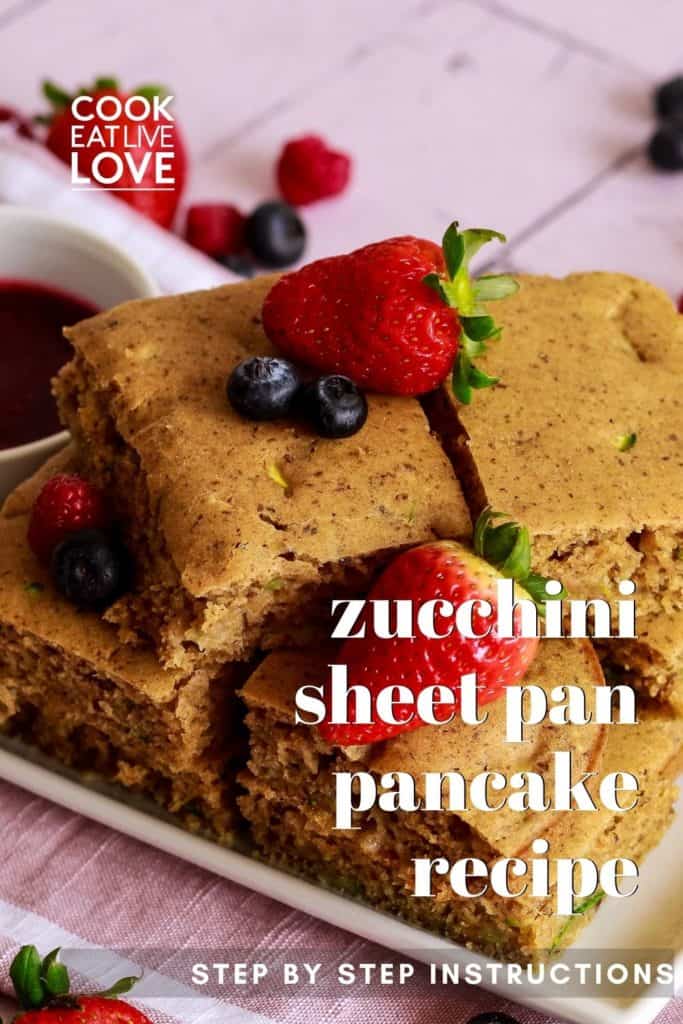 Pin for Pinterest with Stack of vegan sheet pan pancakes covered with berries.
