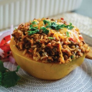 Stuffed pepper with lentils and rice on a plate