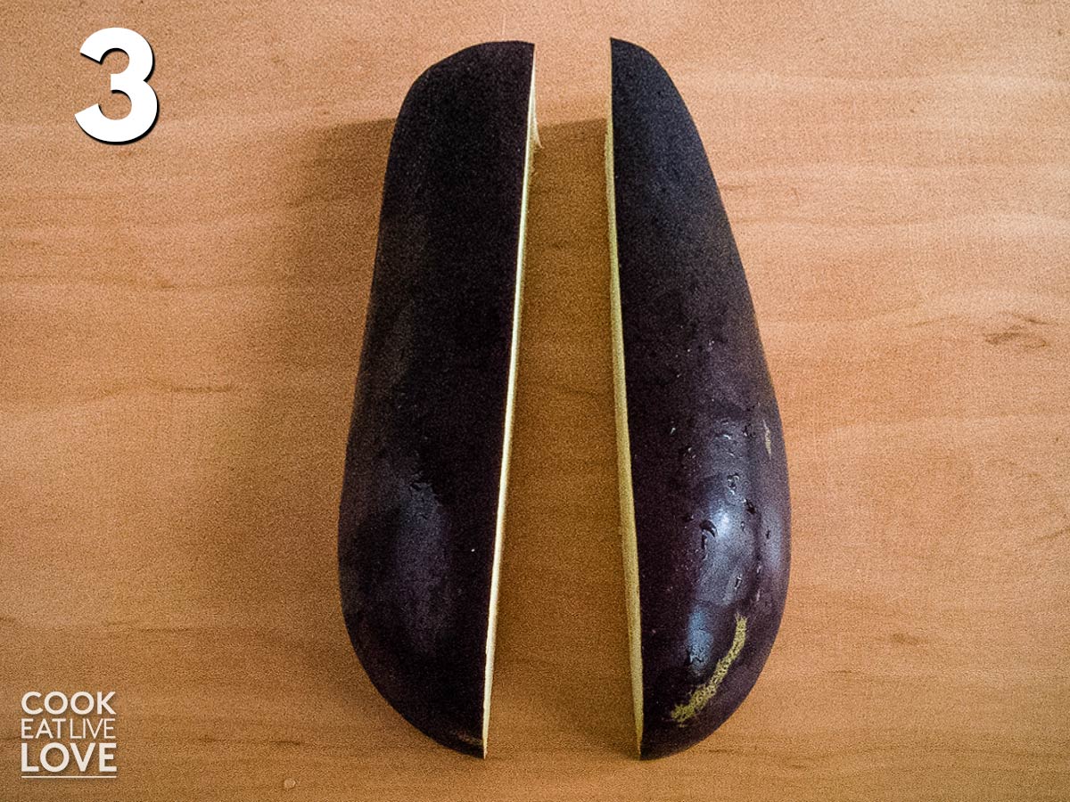 Eggplant half is cut into half again to form bacon slices.