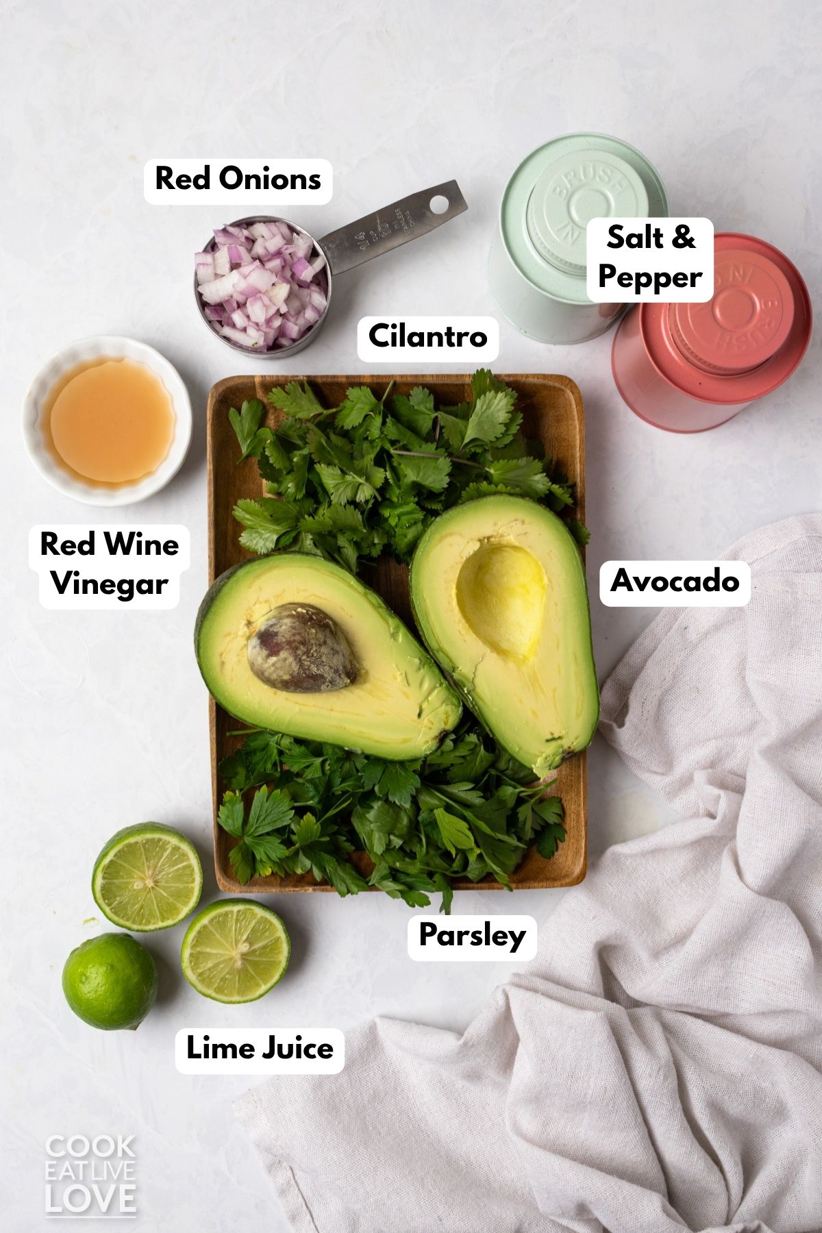 Ingredients to make homemade avocado sauce on the table. 