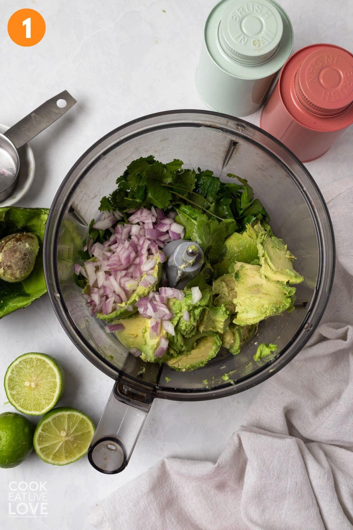 Ingredients added to a food processor bowl.