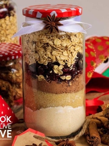 Cookie ingredients layered in a jar for a gift.