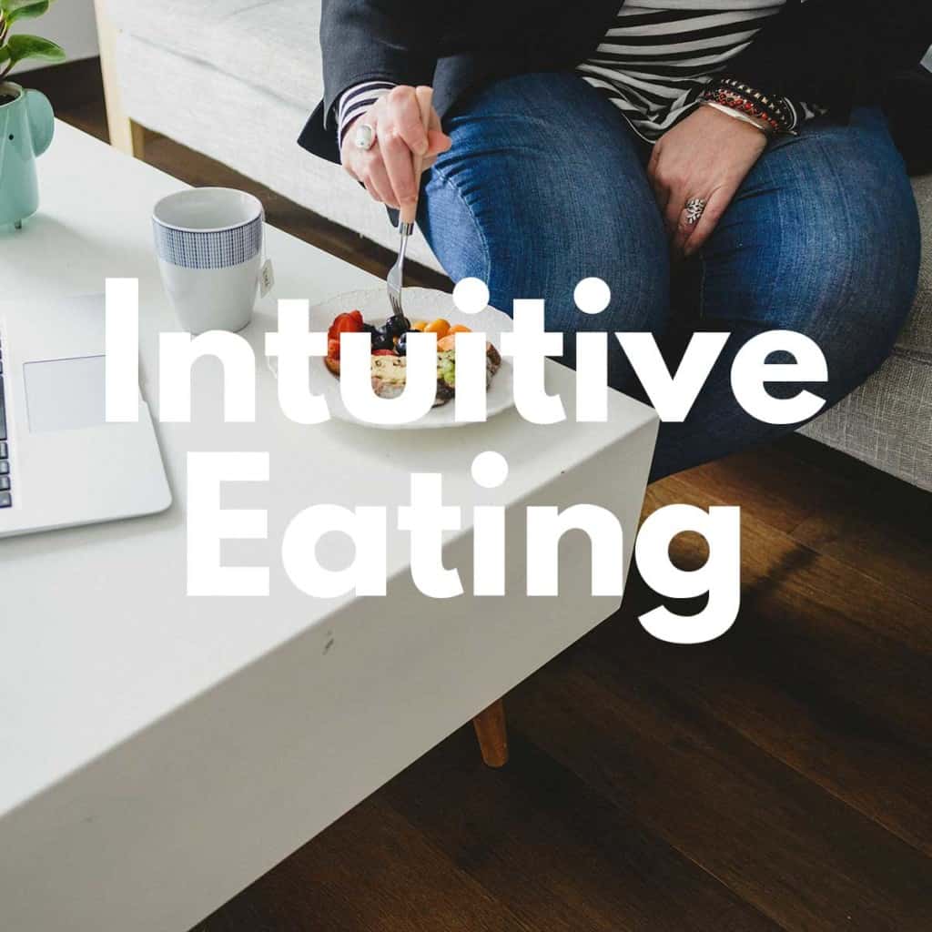 LInk to Intuitive eating content with woman eating in photo and text on top.