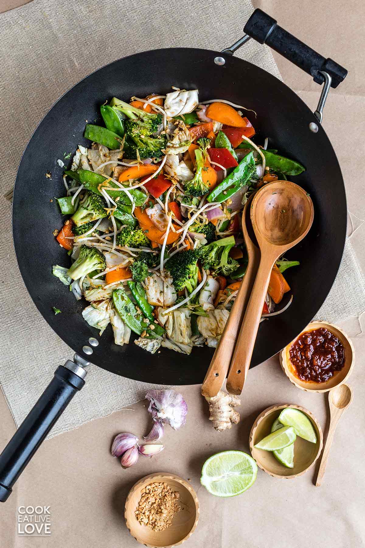 Plant based stir fry vegetables in a wok ready to serve.