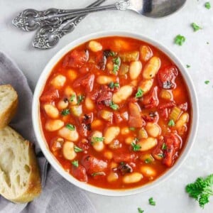 Bowl of white bean tomato stew.