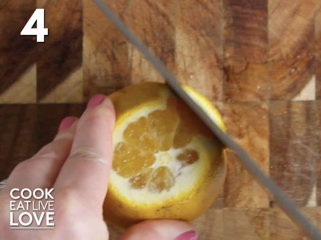 Peeling the orange with a knife