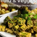 Pin for Pinterest with close up image of pesto tofu served up on plate.