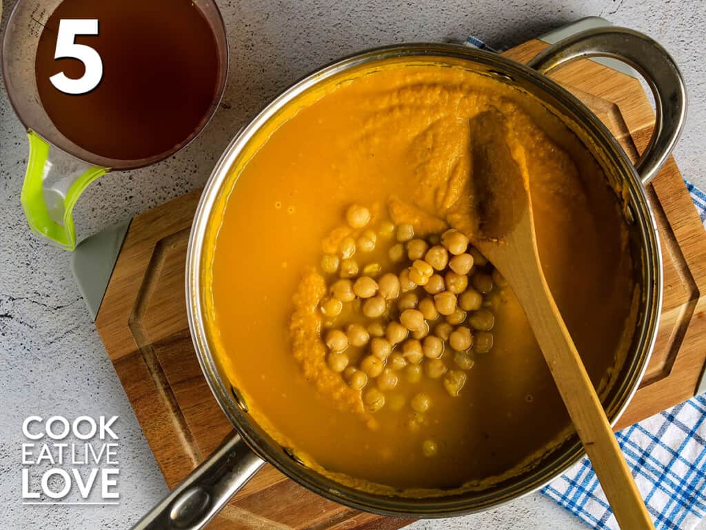 Chickpeas are added to creamy curry sauce
