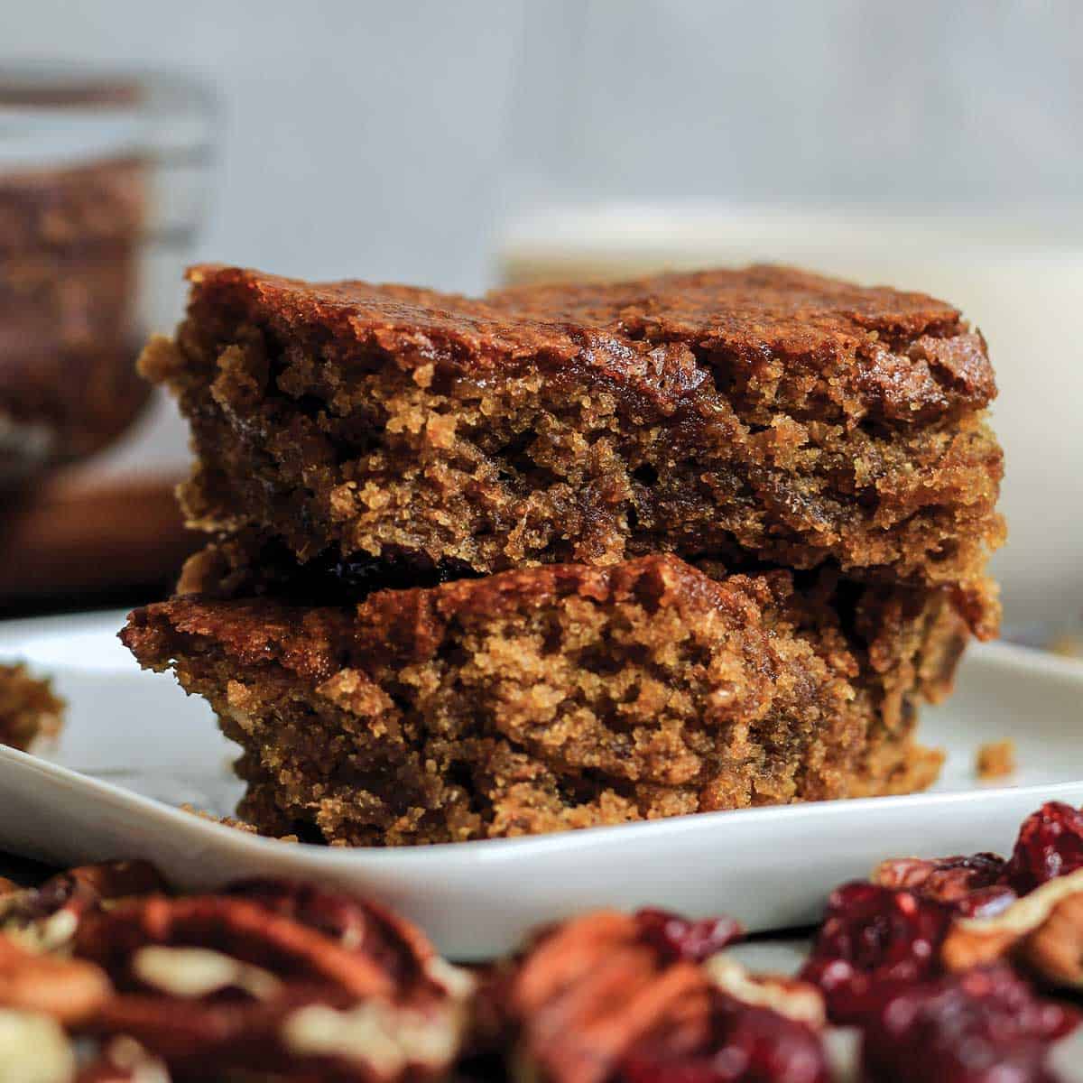 Two vegan blondies on a plate.