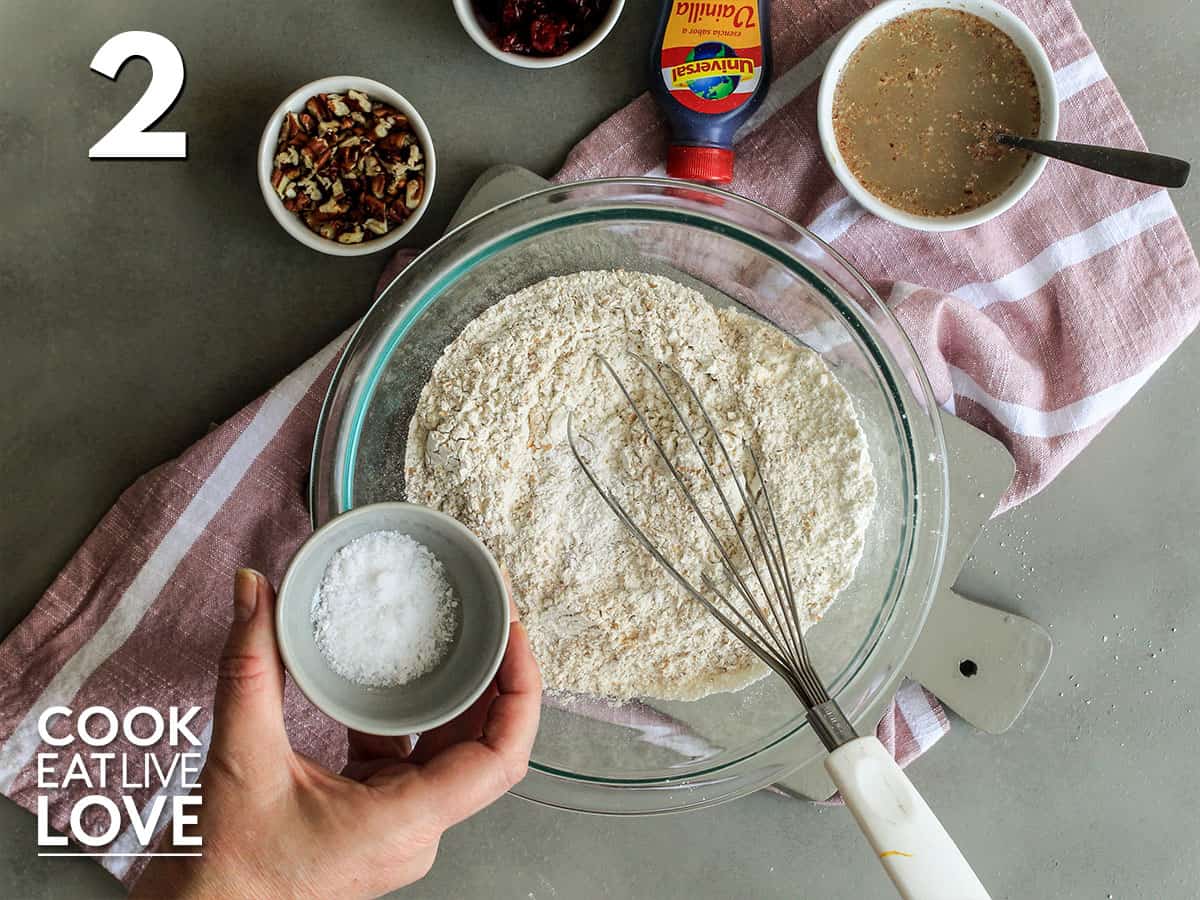 Adding dry ingredients to flours in bowl