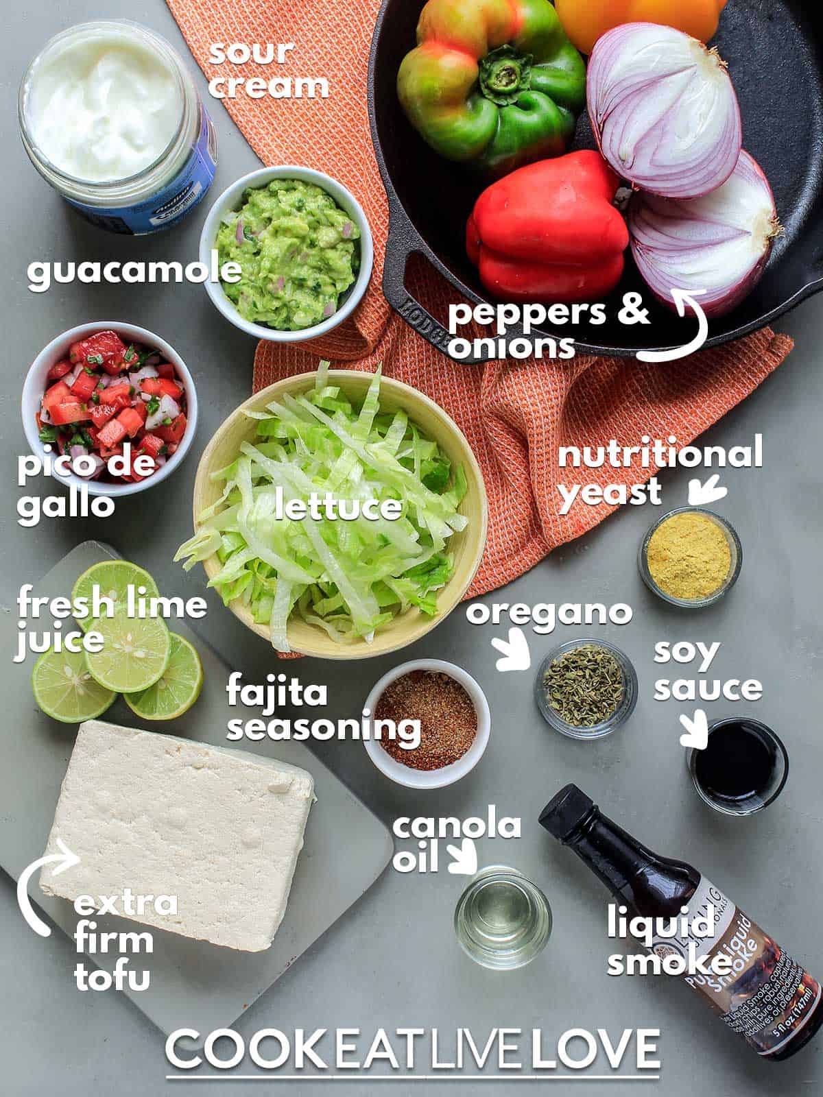 Ingredients to make tofu fajitas on the counter with text labels on top.