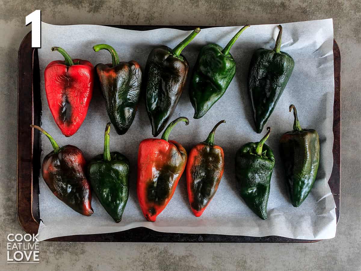 Poblano peppers lined up on a tray