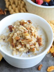 Bowl of barley porridge on the table.