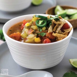 Bowl of vegan taco soup with jalapeno garnish