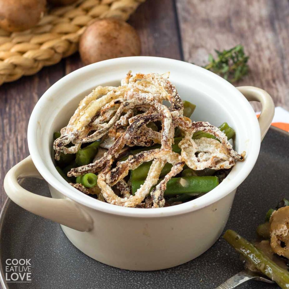 Dairy-free green bean casserole in an individual serving dish.