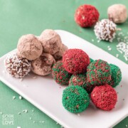 Vegan chocolate balls on a plate with sprinkles