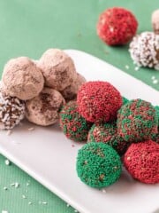 Vegan chocolate balls on a plate with sprinkles