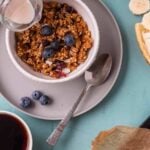 Pin for pinterest with images of nut-free granola and text on top.