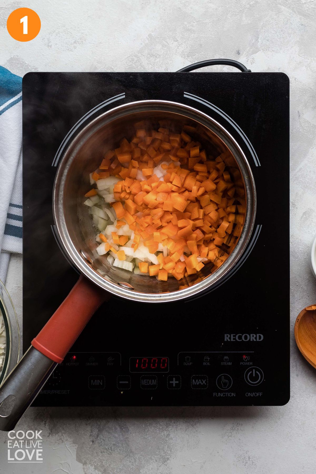 Vegetables cooking in a pot.